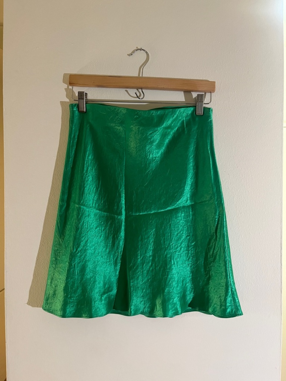 Emerald green satin miniskirt